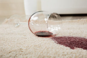 Red Wine Spilled From Glass On Carpet